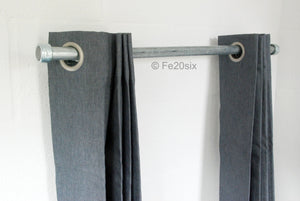 The Pyper by Fe20six. An urban industrial curtain pole in silver galvanized metal finish.