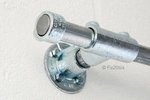 The Pyper by Fe20six. An urban industrial curtain pole in silver galvanized metal finish.