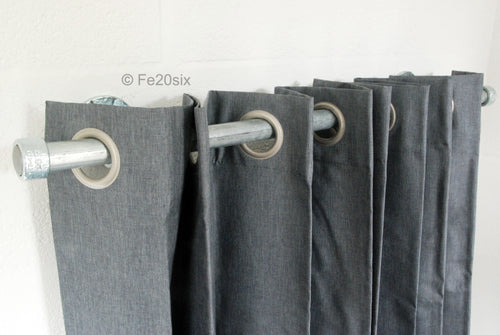 The Pyper by Fe20six. An urban industrial curtain pole in silver galvanized metal finish.